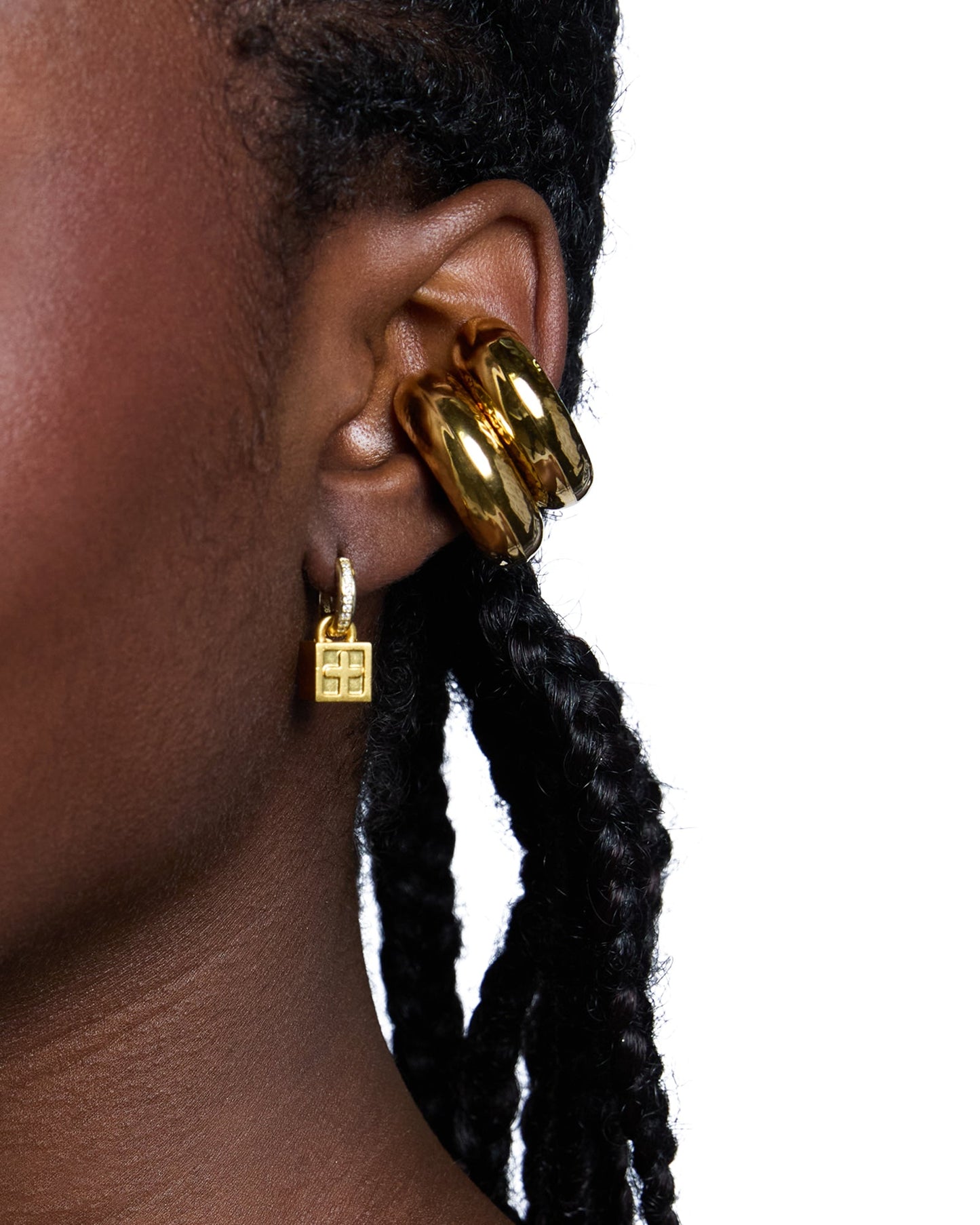 KRYSTAL BOX CROSS HUGGIE EARINGS GOLD